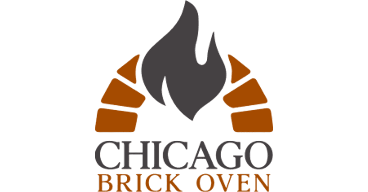 Chicago Brick Oven wood-fired dome pizza oven with visible flame and glowing embers inside — mid-cook with a pizza on the deck.